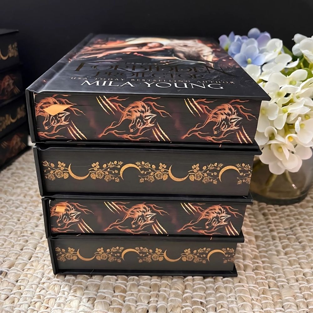 Stunning special edition hardback book with a gorgeous gold foil cover and wolf print edging