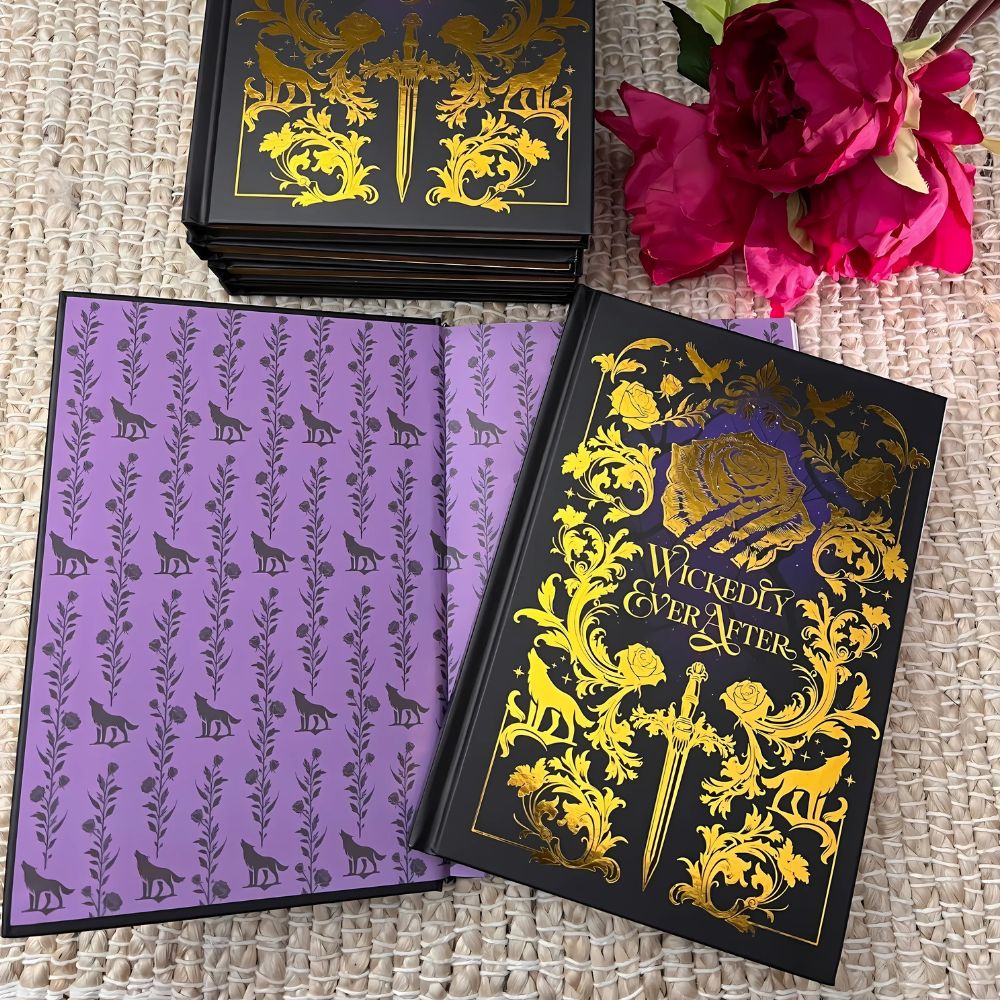 Gold foil embossed blank notebook with Wickedly Ever After design