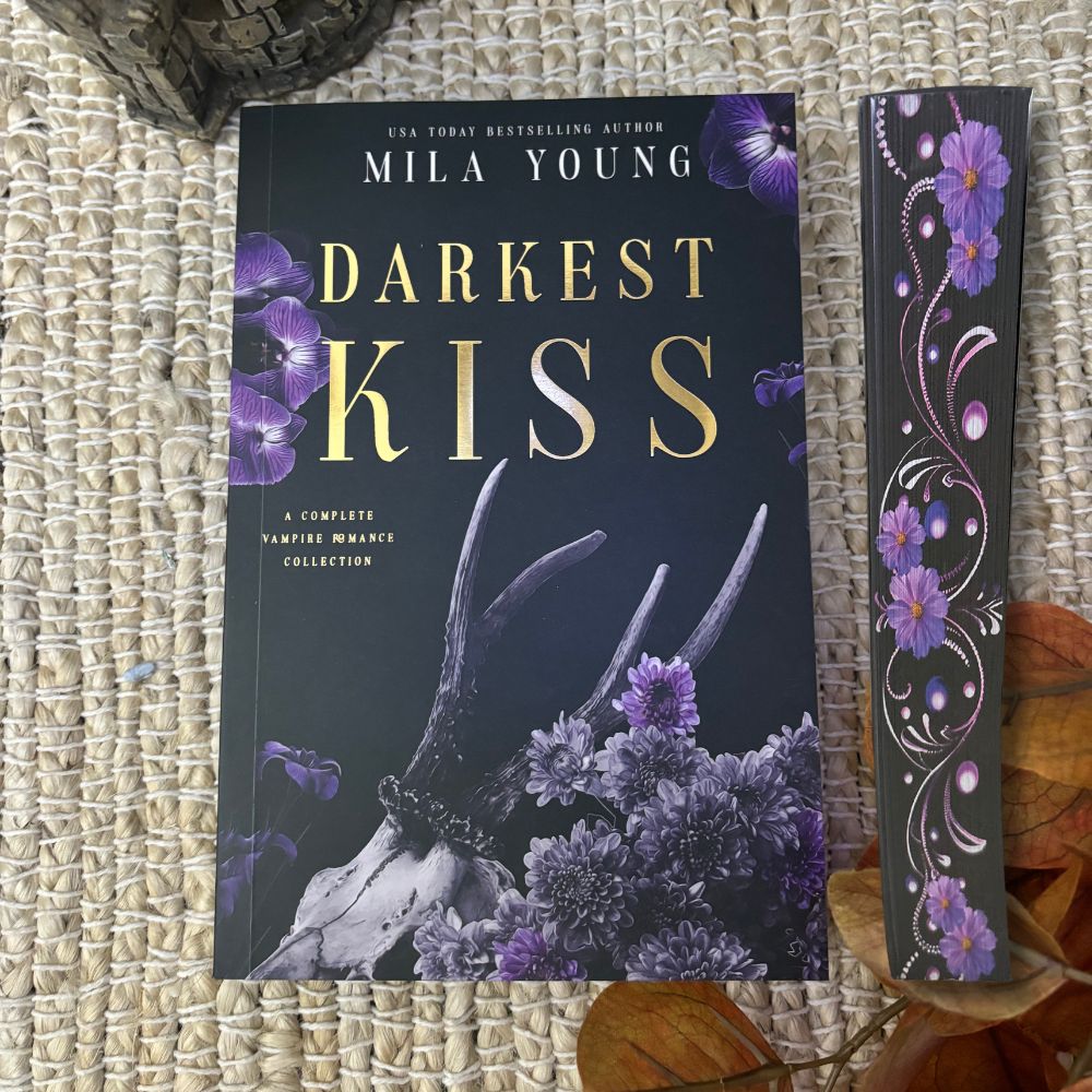 Close-up of the spine of *NEW* Darkest Kiss - Special Edition Paperback, showing the title and author's name