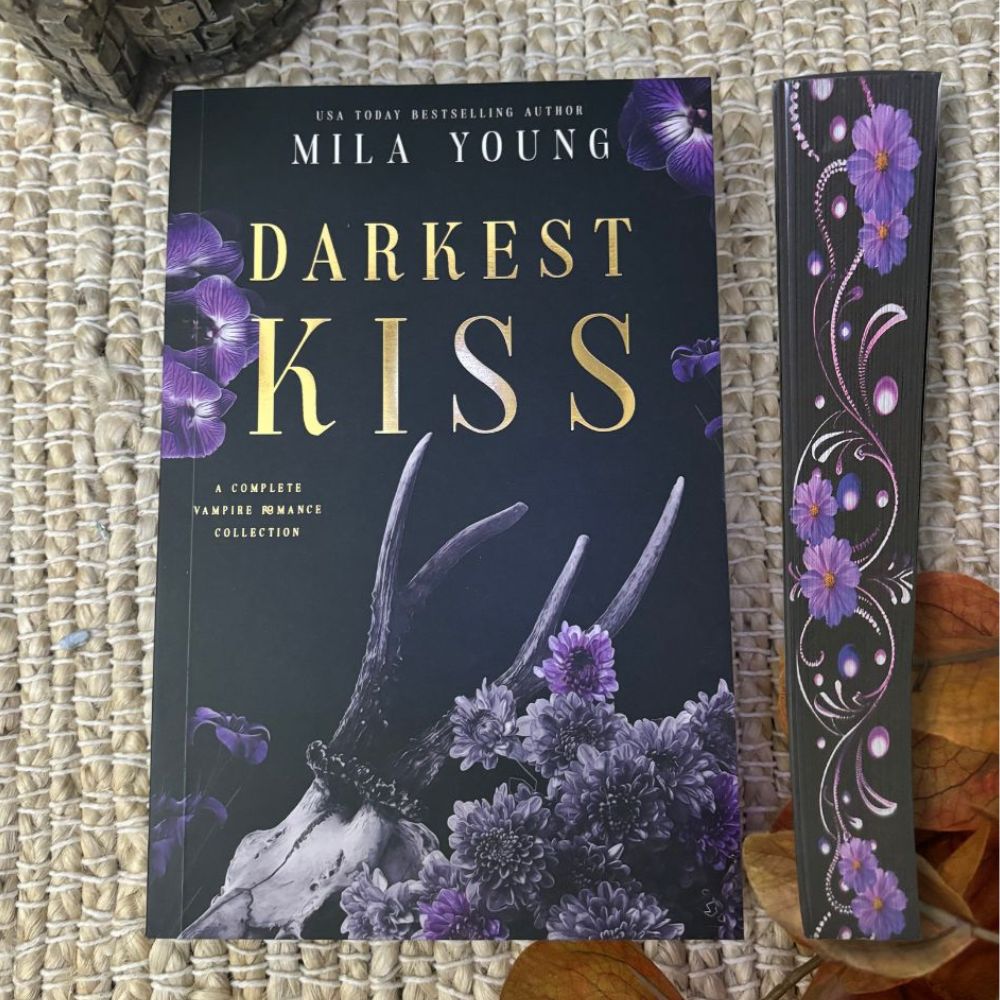 Damaged Darkest Kiss special edition foil paperback featuring vampire, fallen angel, and demon characters with printed edges and chapter artwork, heavily discounted due to minor damage