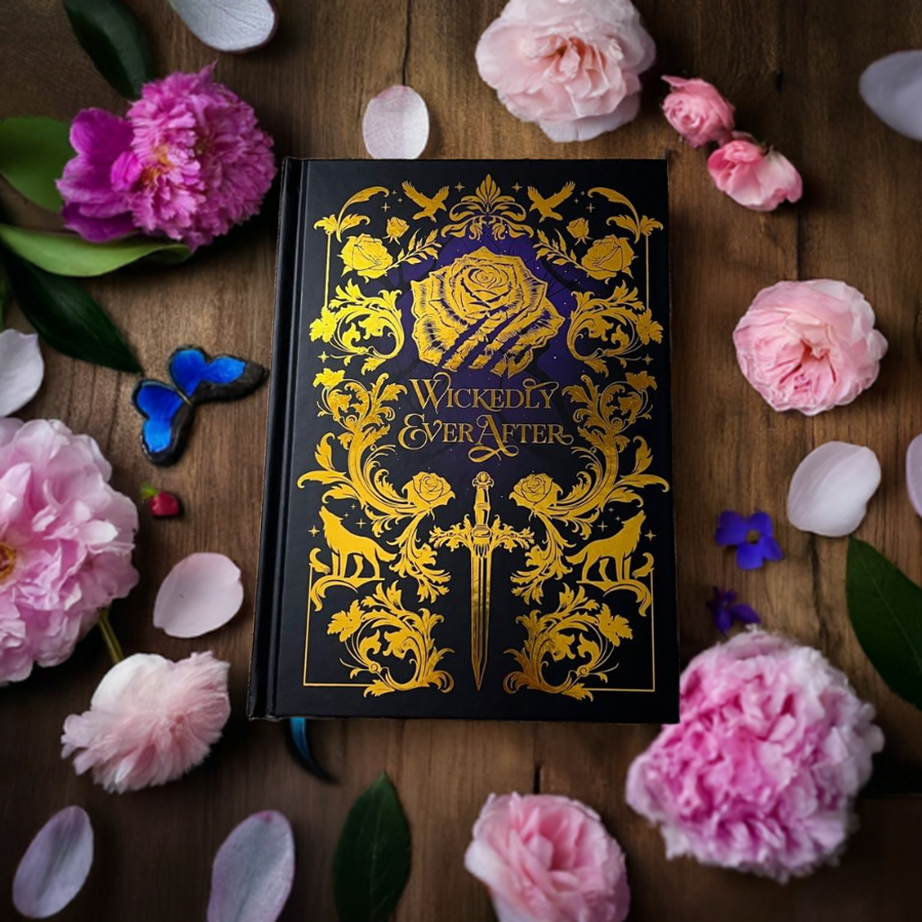 Gold foiled blank notebook with a wickedly ever after design