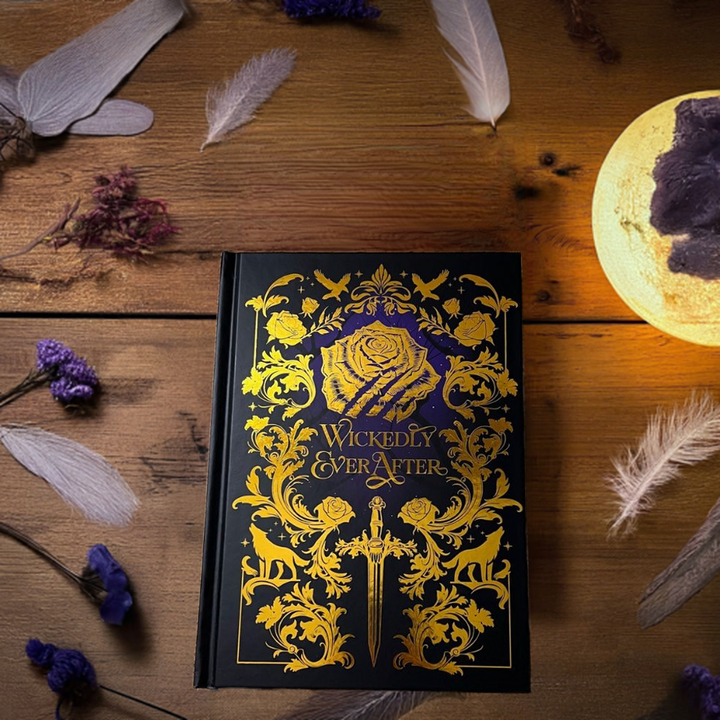 Gold foiled blank notebook with Wickedly Ever After design on cover