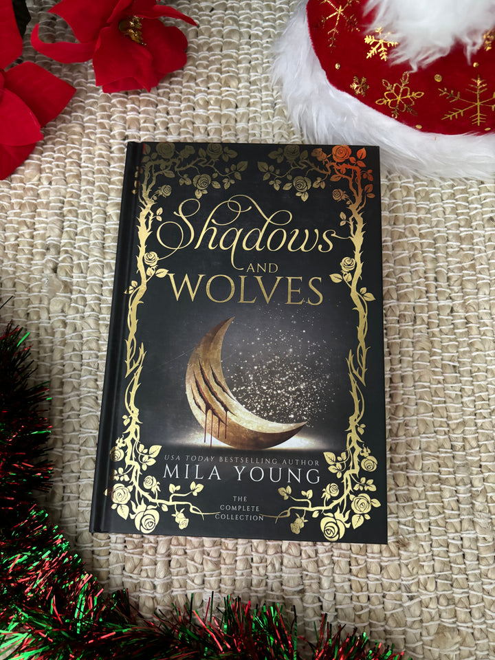 *NEW* Shadows and Wolves - Hardback Special Edition with NEW Edging Artwork book cover featuring an intricate design of shadows and wolves in a hardback special edition 